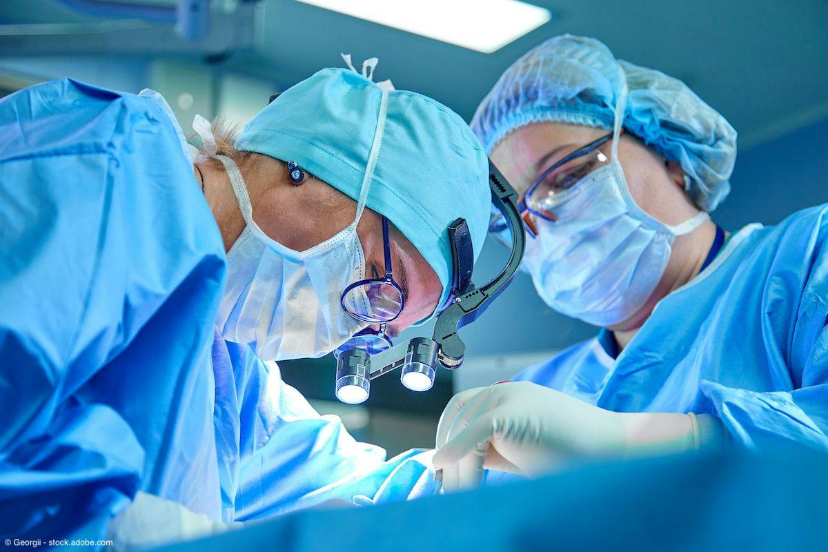 two surgeons operating