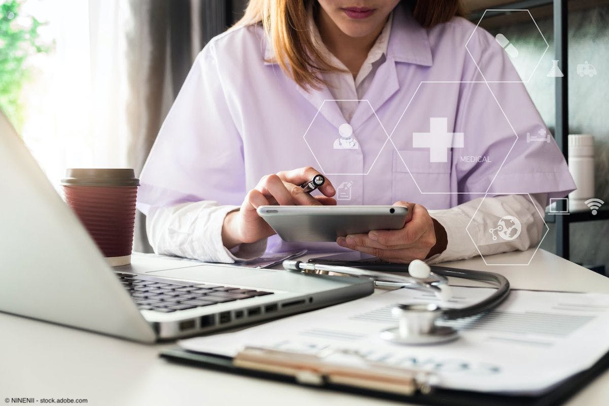 Female doctor working on tablet | Image Credit: © NINENII - stock.adobe.com